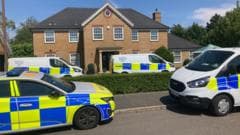 International manhunt after mother and two children found dead at home